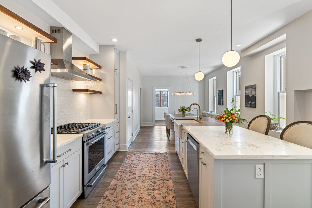 Shaker Kitchen Cabinetry & Walnut Floating Shelves